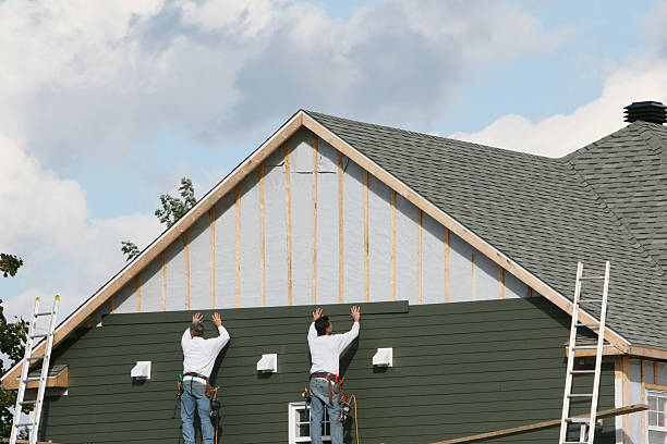 Professional Siding Contractor technician working in Louisville, OH